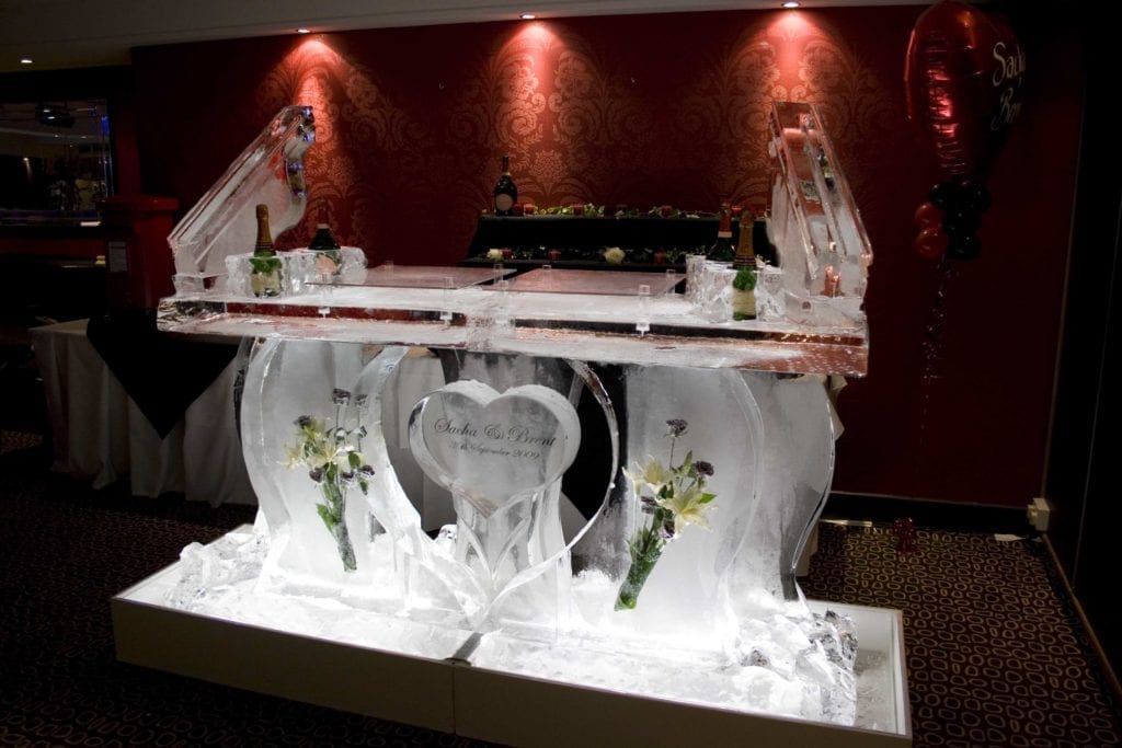 Wedding flower ice bar sculpture with luge