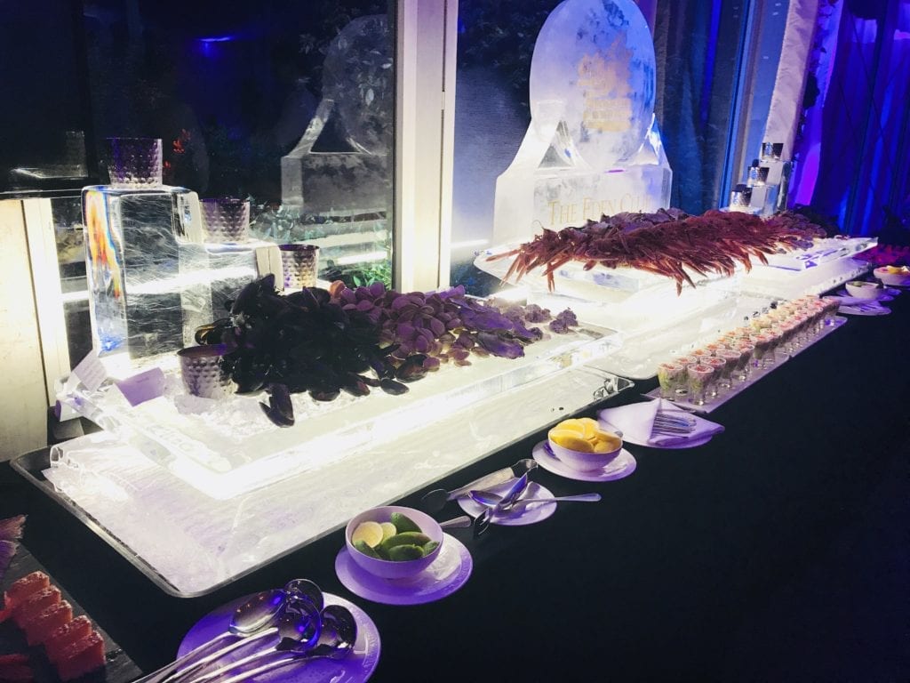 Seafood chilling on wedding ice sculpture