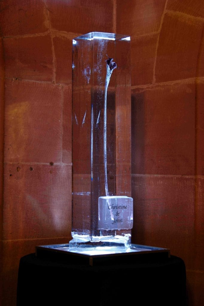 Flower encased ice sculpture for wedding